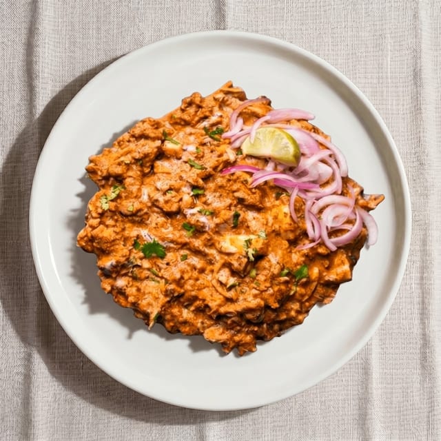 Tikka Bharta.
